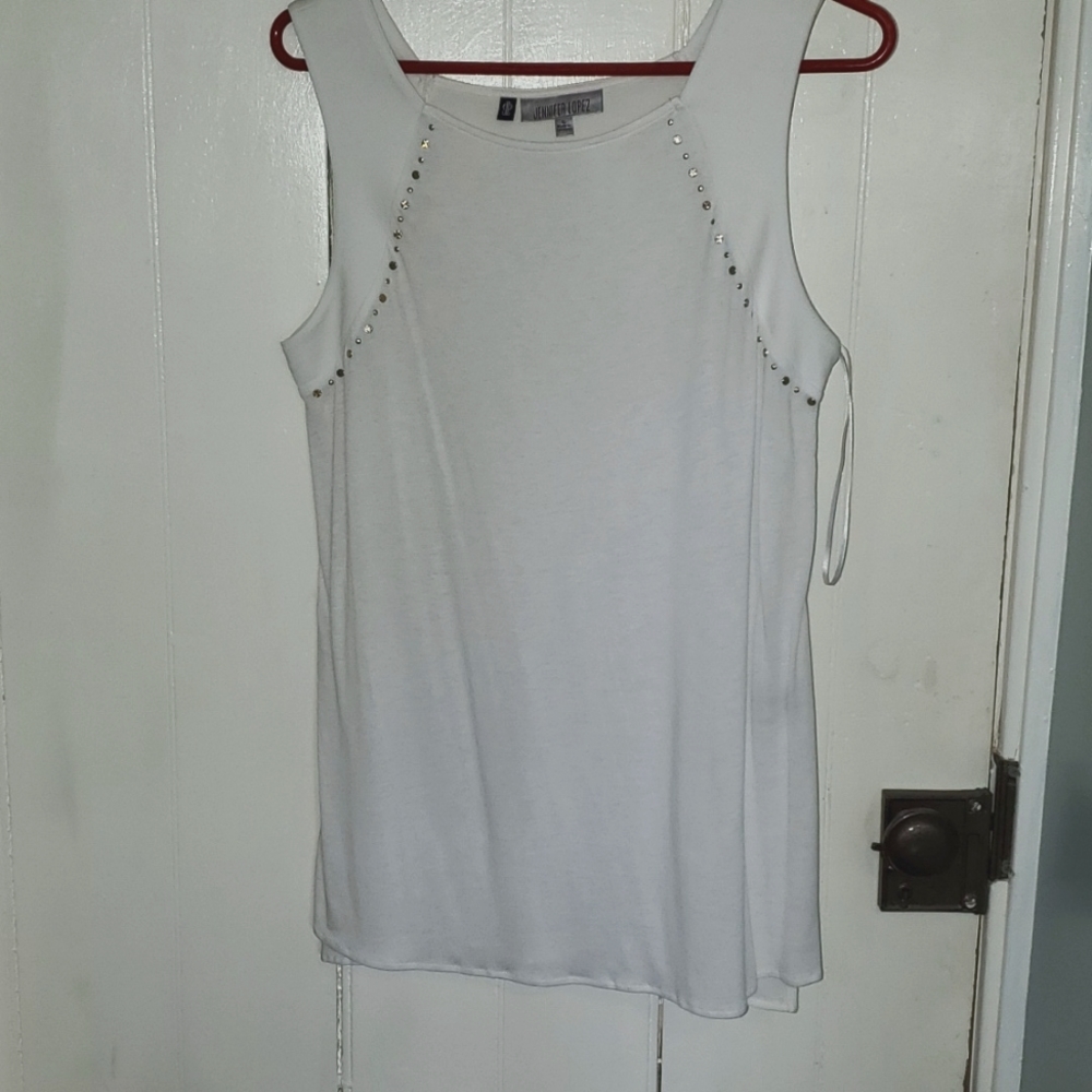 Tank top by Jenifer Lopez  size large.  white with metal embellishments